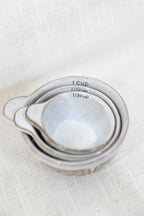 MEASURING CUPS WITH WAX RELIEF PATTERN