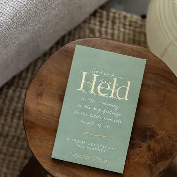 HELD: A 50 DAY DEVOTIONAL FOR PARENTS