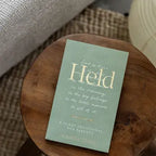 HELD: A 50 DAY DEVOTIONAL FOR PARENTS